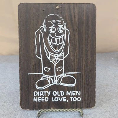 VTG 1968-73 Pressboard KMart Wall Sign Plaque "Dirty Old Men Need Love, Too" - Image 1 of 2