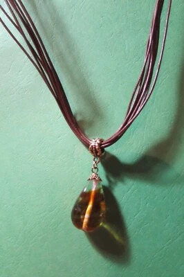 Lia Sophia 8 strand brown leather cord necklace with amber color glass bead fob - Image 1 of 4