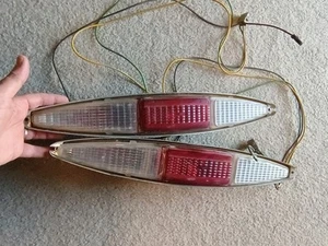 67 Cadillac Deville LEFT + RIGHT REAR BUMPER END TAIL LIGHTS Untested Bulbs - Bild 1 von 14