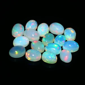 Cabujón ovalado ópalo etíope piedra preciosa suelta 5x4x2,5 mm 3,70 quilates Welo fuego peso 17 - Imagen 1 de 3