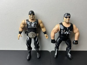 Lot Of 2 Vintage Hollywood Hulk Hogan WCW NWO Wrestling Figures (Read) - Picture 1 of 6