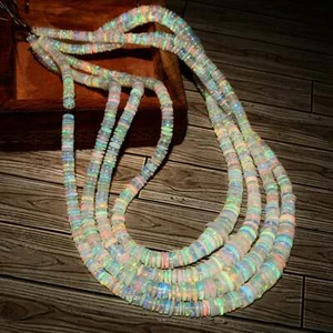 AAA 100% Natural Ethiopian Welo fire Opal heishi Round Tyre Faceted Beads 3-6 mm - Picture 1 of 5