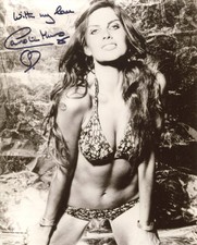 007 Bond girl Caroline Munro signed 8x10 busty cleavage photo 