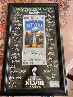 Super Bowl XLVIII Ticket & Signatures of The Seattle Seahawks 2013 NFL Seahawks - Image 1 of 4