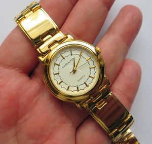 Charakter Gold Quarz Herrenuhr, original goldfarbenes Armband, TMI Werk. SINGAPUR - Bild 1 von 10