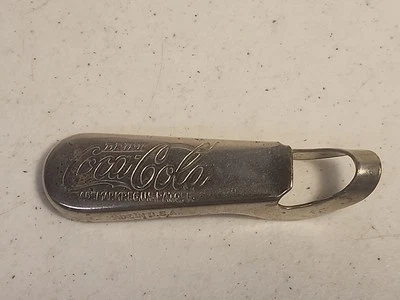 VINTAGE 1940'S DRINK COCA-COLA CONSOLIDATED CORK CORP. BOTTLE OPENER  - Image 1 of 4