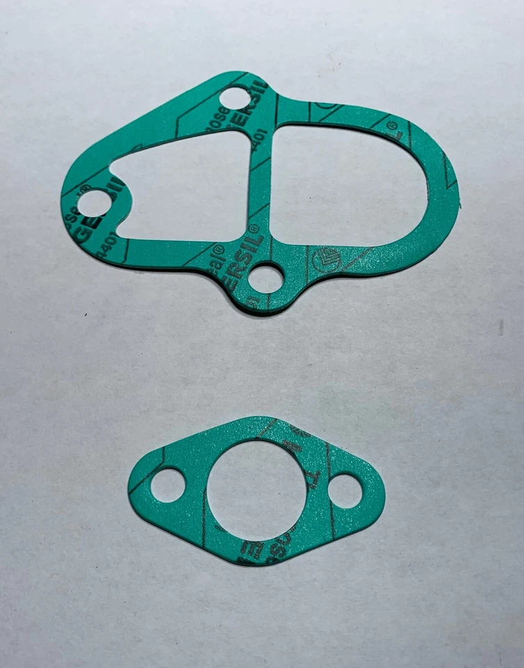 BOMBA DE AGUA Y JUNTAS DE RECOGIDA DE ACEITE MOTOR MAZDA RX7 13B 1986-1995 Foto 1 de 1