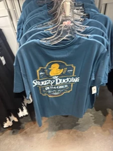 Camiseta Enredada Patito Acurrucado Parques Disney 2025 Talla 2X Nueva - Imagen 1 de 2