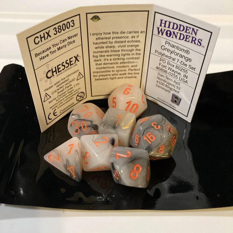 Juego de 7 dados Chessex 38003 Hidden Wonders Phantom gris/naranja poliédrico Foto 1 de 1