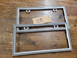2x Nuevo de Lote Antiguo OEM Ford Lincoln Mercury Marco de Placa de Plástico D8AB-17A394-AWA - Imagen 1 de 4