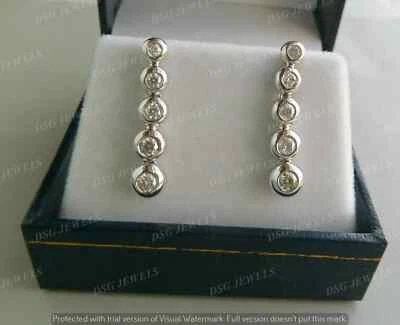 Conjunto de aretes colgantes de plata de ley 925 real con bisel de diamantes creados en laboratorio de 1 quilate Foto 1 de 4