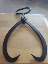 Antique Ice Tongs One handle Two tongs one joint. 14" Spread. 16" Tall. 