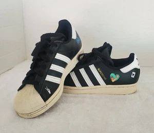 Adidas Original Superstar Junior FX5880 Black/White/ Empowering Graphics Flaw - Picture 1 of 18