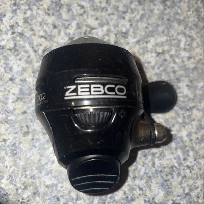 Carrete de pesca Zebco 202 carrete giratorio con botón pulsador negro Foto 1 de 4