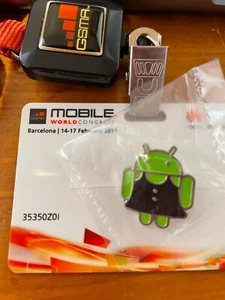 Android Emaille Pin 2011 Mobile World Congress MWC Black Dress - Bild 1 von 2