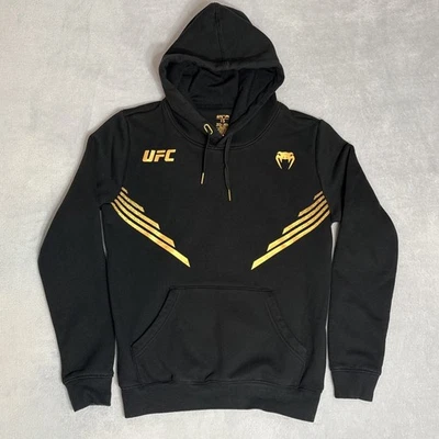 Sudadera con Capucha UFC Venum Negra Dorada Lucha Noche Walkout Sudadera Para Hombres Pequeña Foto 1 de 4