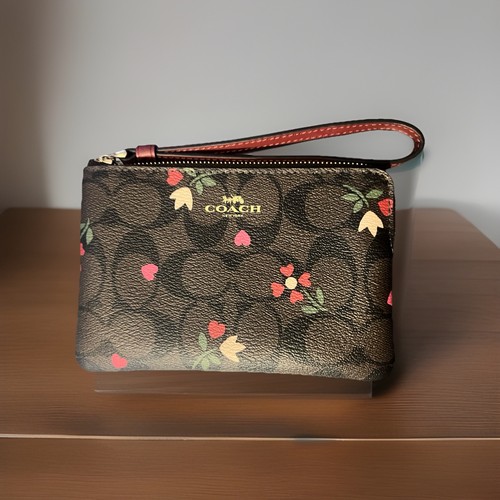 Bracciale Coach con zip angolare nuovo con etichette in tela firmato cuore stampato petalo raro