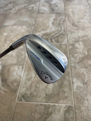 Callaway Jaws Raw Chrome Wedge 54° 12W-Grind Catalyst 80 Graphite Left Hand - Image 1 of 4