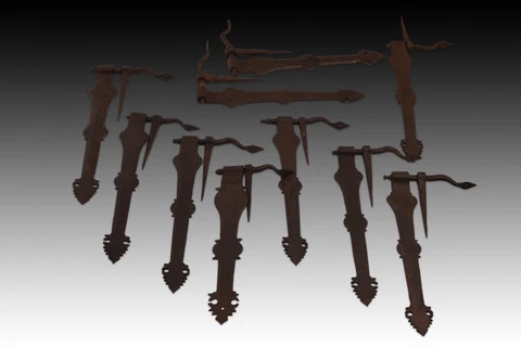 Ten wrought iron chest fittings or hinges. 20th century, after earlier models Cover