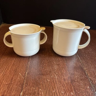 Tupperware Sugar Bowl 2310A and Creamer 2309A with Flip Pale Pink Lids 2311A Set - Image 1 of 4