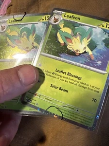 Pokemon Prismatic Evolutions Leafeon 170 SVP SWIRL 1x - Bild 1 von 1