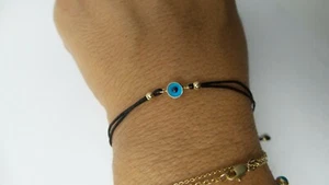 PULSERA MAL OJO CUERDA TIRAR ORO 14K - Imagen 1 de 6