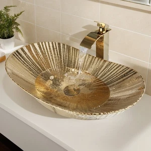 Lavabo de cerámica con grifo y desagüe 24x14 pulgadas ovalado dorado - Imagen 1 de 12
