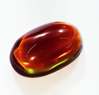 Gema certificada de ópalo sintético negro y dorado australiano 34,25 quilates de 34,25 quilates Foto 1 de 4