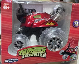 THUNDER TUMBLER RADIO CONTROL 360* TALLY CAR RED W/LIGHT UP WHEELS  - Picture 1 of 4