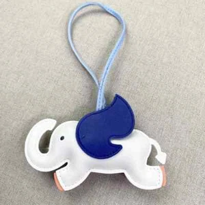 Llavero colgante de cuero PU para colgar elefante volador decoración para bolso de dama - Imagen 1 de 39