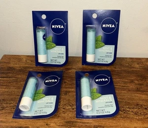 4 Packungen, Nivea Minze & Mineral Erfrischende Lippenpflege Shea & Pfefferminzextrakt - Bild 1 von 7