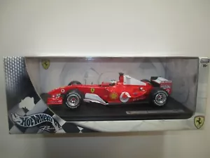FERRARI F1 F2004 RUBENS BARRICHELLO SCALA 1:18 HOTWEELS B6201 - Foto 1 di 1