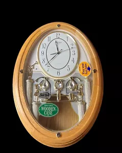 Orologio movimento musicale piccolo mondo rovere massello - orologio movimento musicale 15 melodie - Foto 1 di 9