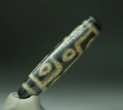 Cuentas Dzi con motivo de 9 ojos de ágata antigua indo/tibetana 11*54 mm anteriores a 1800 Foto 1 de 4