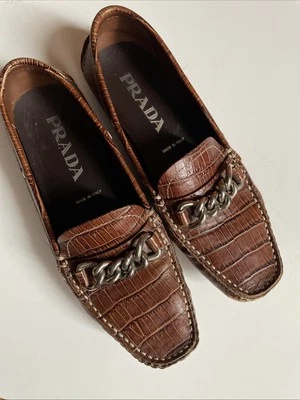 Mocasines sin cordones Prada para mujer de cuero con estampado animal cadena Italia 6 Foto 1 de 4