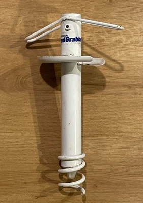 El agarrador de arena original para sombrillas de playa y soporte para caña de pescar Foto 1 de 4