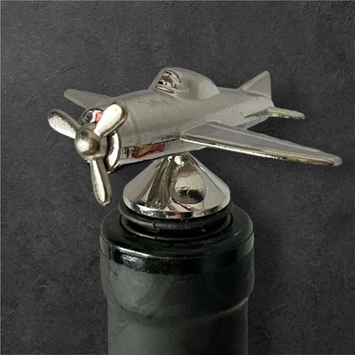 Tapón de vino para avión - Conserva la frescura con estilo - Botella de metal única mar... Foto 1 de 4