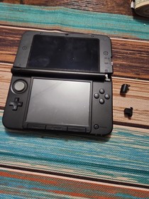 Nintendo 3DS XL Handheld Game Console . FOR PARTS ONLY