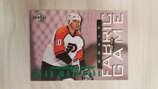 1997 DONRUSS JOHN LECLAIR /750 STAR MATERIAL FABRIC OF THE GAME #63 OF 72