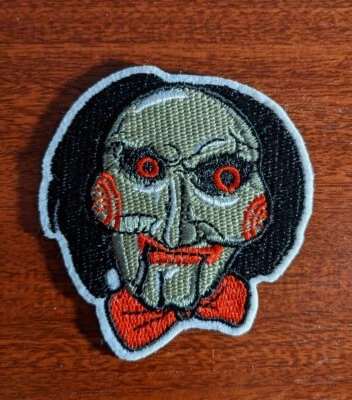 Jigsaw Saw Patch Movies Series Horror Goth Halloween Embroidered Iron On 3"x2.5" - Image 1 of 3