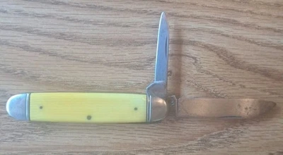 Navaja de bolsillo amarilla publicitaria vintage Camco EE. UU. Avery Felt Co dos hojas. Foto 1 de 4