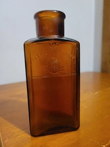 EL ALIMENTO PRE DIGERIDO PIÑA PUSKOLA ÁMBAR BOTELLA DE MEDICINA EN RELIEVE - Imagen 1 de 8