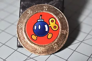 Super Mario Nintendo Metal Coin Token Frankford Candy Bob-omb - Picture 1 of 3