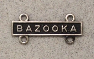 U.S. Army: BAZOOKA - bar for Marksmanship Badge, nhm, black background - Picture 1 of 1