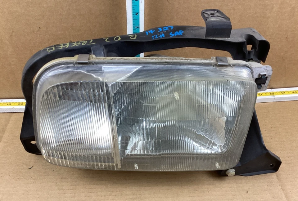 Faro derecho pasajero Chevrolet Tracker 1999-2004 114-60070 OEM Foto 1 de 4