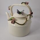 Ceramic Teapot with hand sculpted Flowers and Butterfly. Very charming...