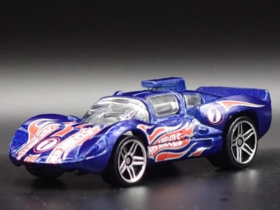 1966-1967 CHAPARRAL 2D Gara Auto 1:64 Scala da Collezione Diorama Modellino Auto - Immagine 1 di 4