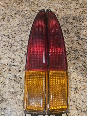 New 1993 - 1996 Cadillac Fleetwood Brougham European amber red tail lights set  - Image 1 of 4