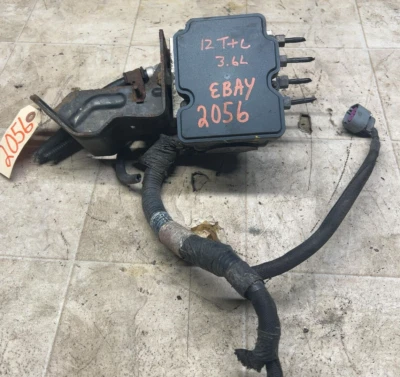 12 TOWN & COUNTRY CARAVANA ABS bomba sistema de frenos antibloqueo montaje de unidad OEM Foto 1 de 4