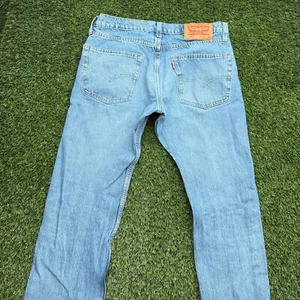 Levis 502 Tapered Jeans Mens 30x34 Blue Denim Light Wash Stretch Distressed - Picture 1 of 11